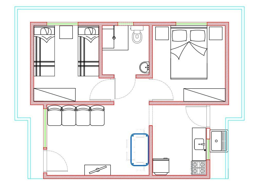 Planta baixa com layout de mobiliário e esquadrias em residência de pequeno porte